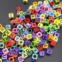 Acrylic Beads With Multicolored Letters Of The Alphabet In The Shape Of A Cube